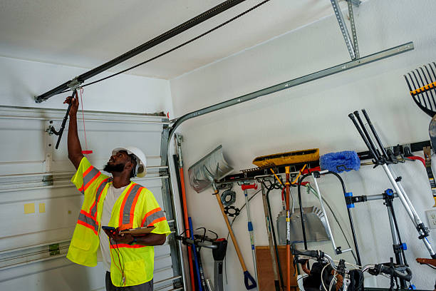 Professional Garage Door Panel Replacement technician working in Hamilton County County, NE